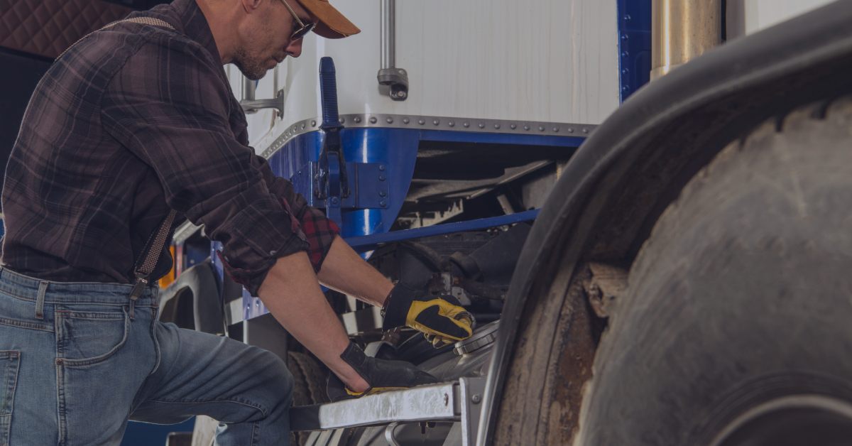 Trucker placing the gas cap back on his semi truck after using his prepaid fuel card